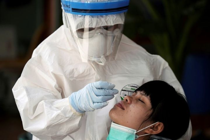 Thailand reports daily record of 985 new coronavirus cases