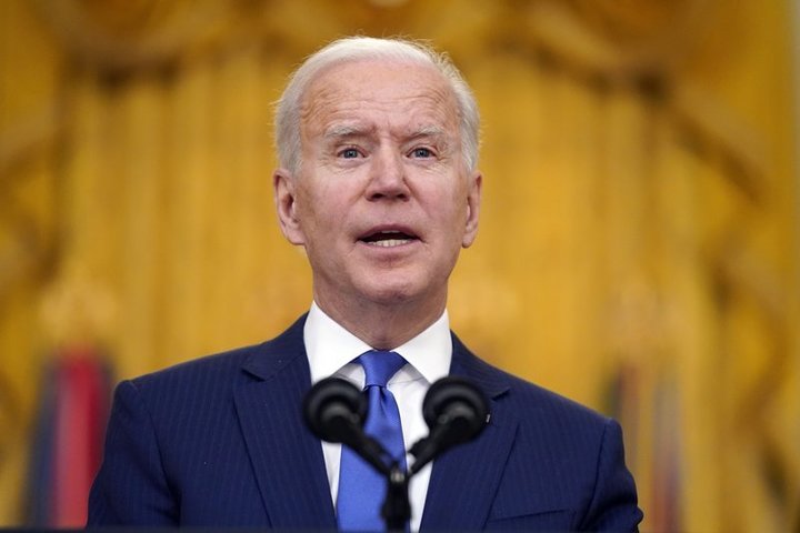 Biden urges Putin to ease Ukraine tensions