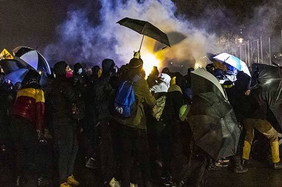 Protesters, police clash for third night over US police shooting