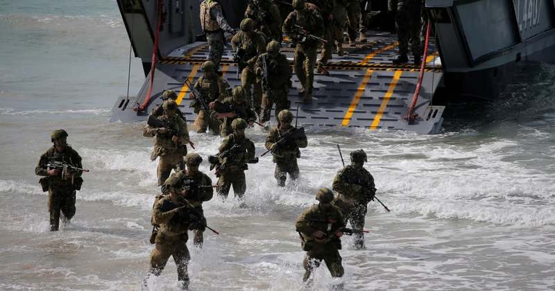 Australia to upgrade military bases, expand wargames with U.S.