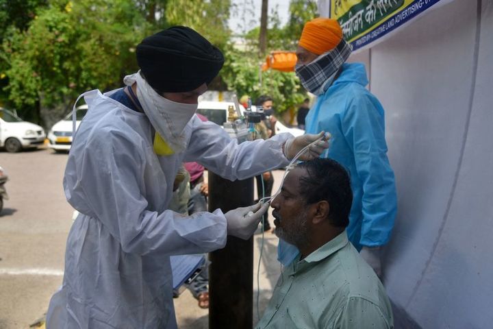 India's COVID-19 case total nears 20 million