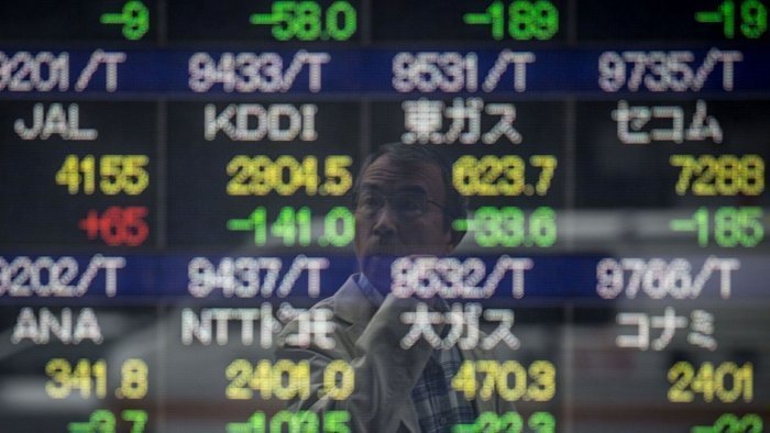 Asian markets swing after Yellen spooks Wall St, eyes on US jobs