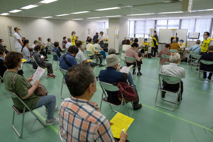 Japan opens mass vaccination sites for elderly ahead of Olympics