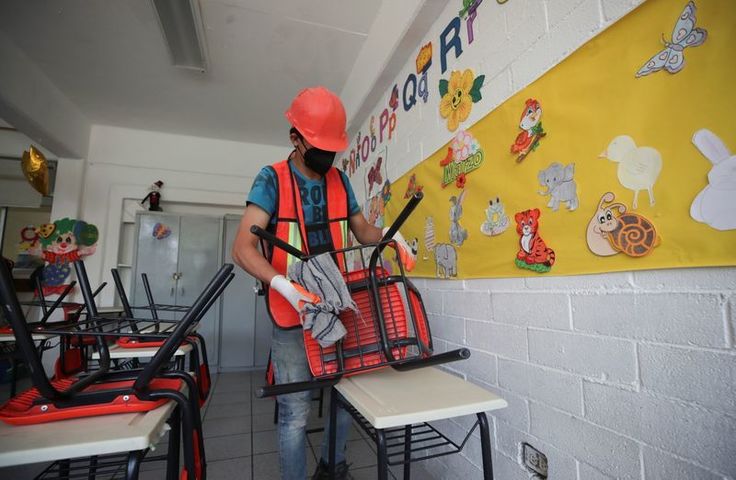 Mexican parents clean reopening schools where thieves took even toilet doors