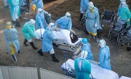 Malaysian volunteer undertakers struggle to cope as COVID cases surge