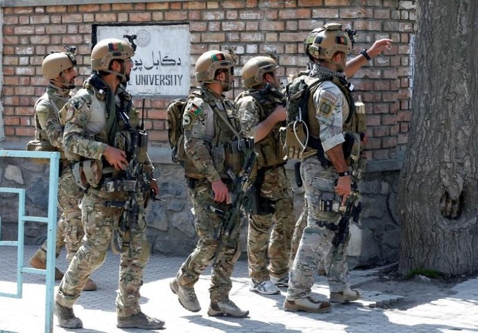 Hundreds of Afghan security personnel flee into Tajikistan as Taliban advances