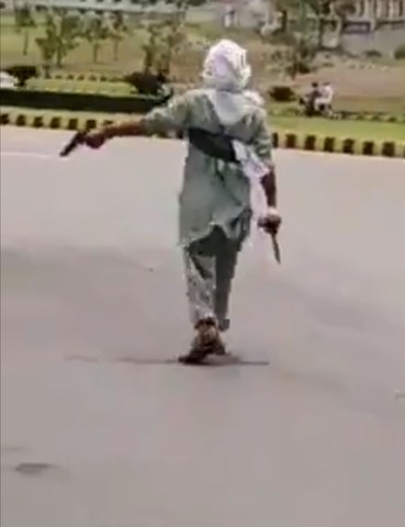 Police arrest man wielding gun outside Parliament House