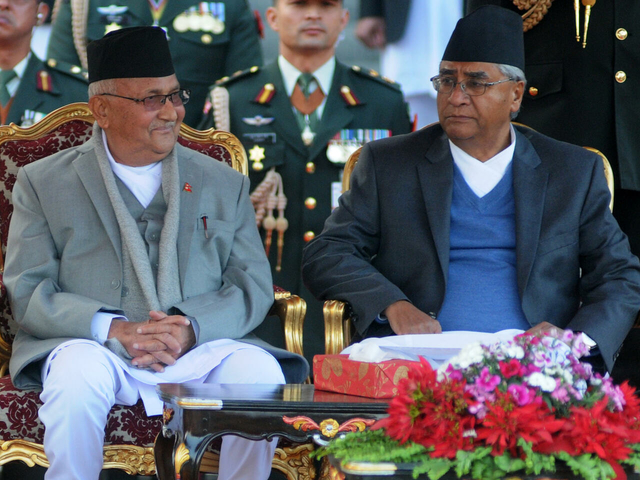 Veteran Nepal lawmaker sworn in as PM for fifth time after court ruling