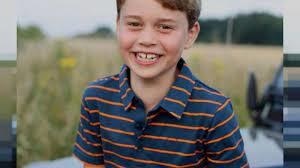 Britain's Prince George marks eighth birthday with a grin