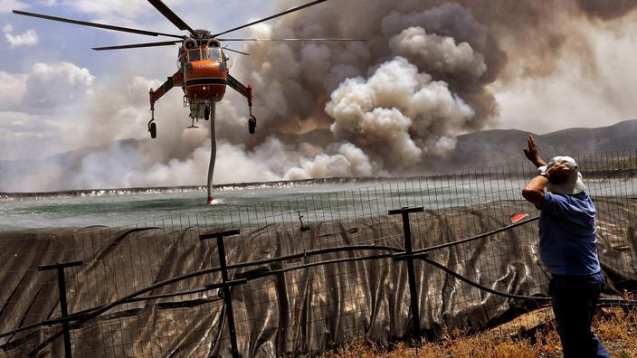 Greece fights fires during 'worst heatwave since 1987'