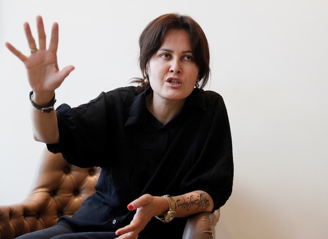 Afghan film director recounts daring escape from Kabul