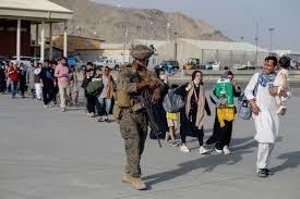 Deadly firefight at Kabul airport as US boosts airlift