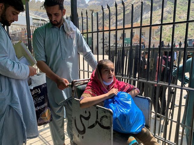 At an Afghanistan border crossing, people face uncertainty and a long wait