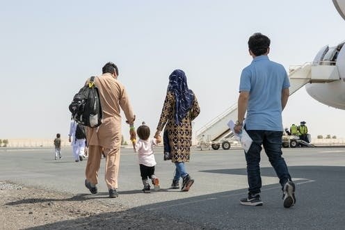 Traumatized and anxious, Afghans evacuees begin life in Australia