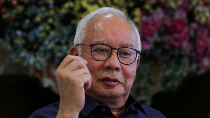 Malaysia's Najib may seek re-election to parliament despite conviction