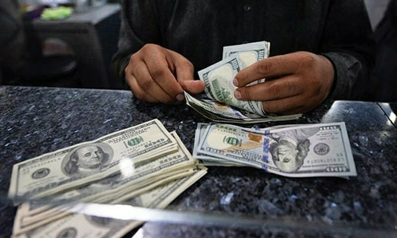 Dollar touches a new record high against rupee