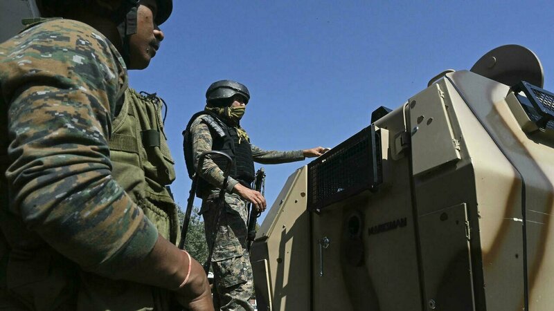 Hundreds detained in Indian Kashmir after teachers shot dead