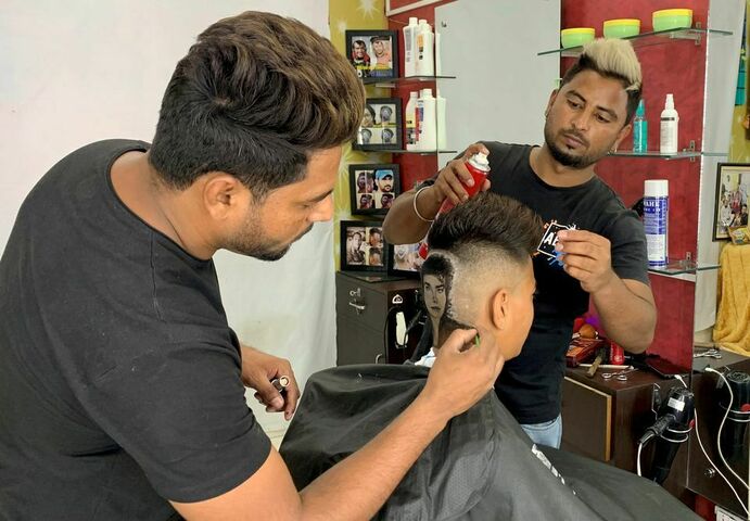 Indian barber siblings turn heads into canvasses by giving unusual haircuts
