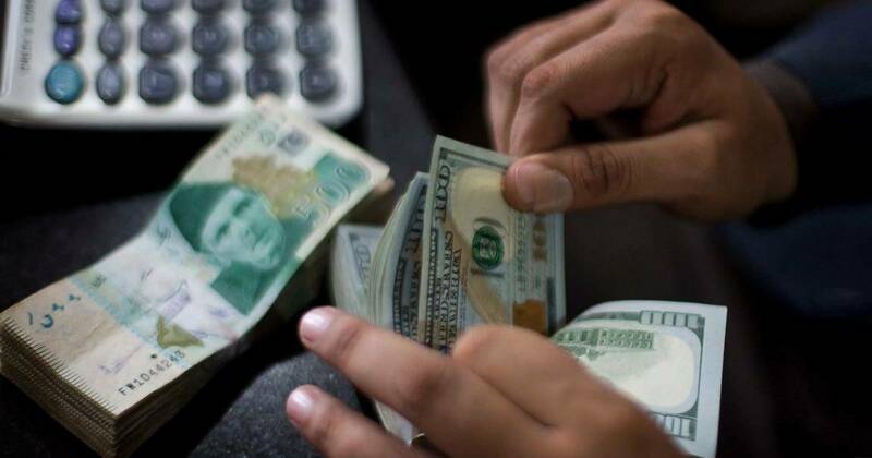 Pakistani rupee staggers to another record low against US dollar
