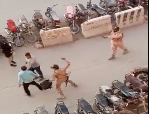 Paramilitary force manhandles photojournalist, trash equipment in Karachi
