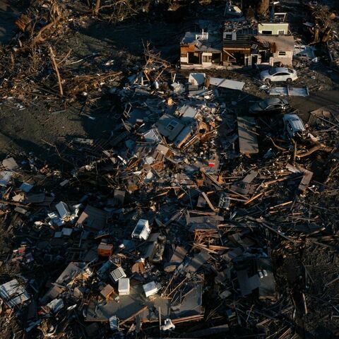 Hope amid the rubble: Kentucky tornado death toll could fall, company says