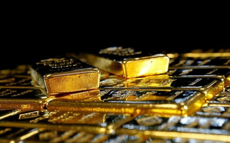 Gold benefits from dollar easing after Fed meeting