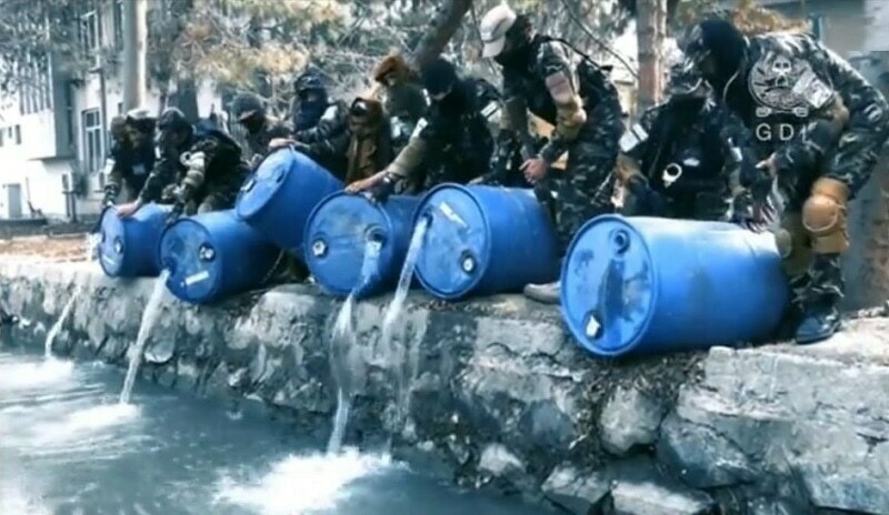 Afghan agents pour 3,000 litres of liquor into Kabul canal