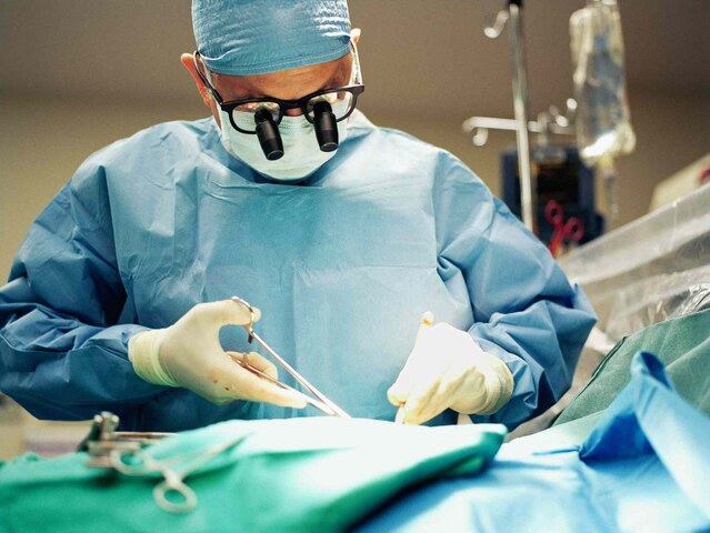 Hospital technician performs surgery, films patient during operation at Daska