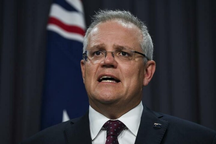 Australian PM says his government was "too optimistic" before Omicron surge