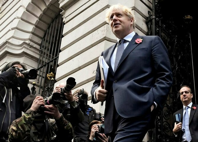 Mired in scandal, British PM Johnson fights to shore up authority