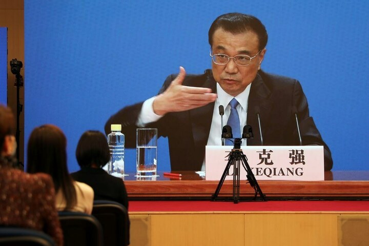 WHO chief says discussed collaboration on COVID origins with Chinese premier