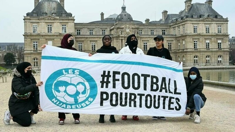 French minister condemns headscarf ban for Muslim footballers