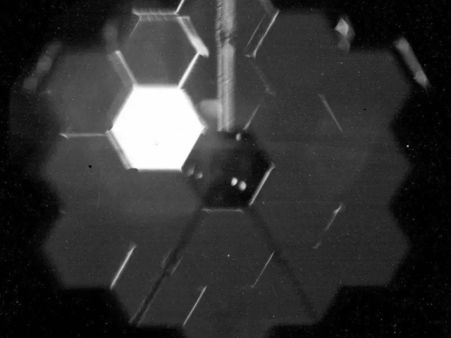Webb telescope spots its first star -- and takes a selfie