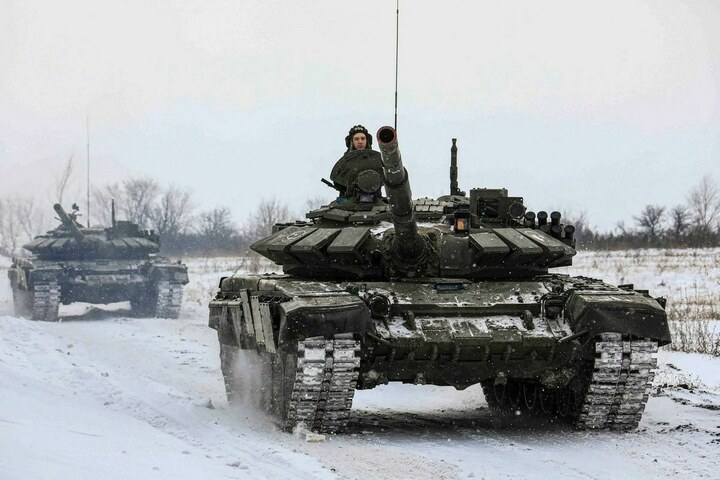 Russia says some troops pull back from near Ukraine, West says no proof yet