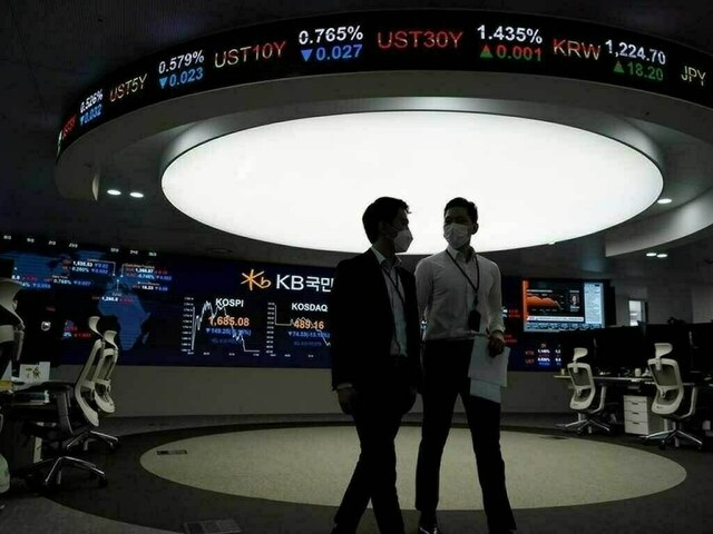 Russia sanctions ripple across world markets, rouble tanks