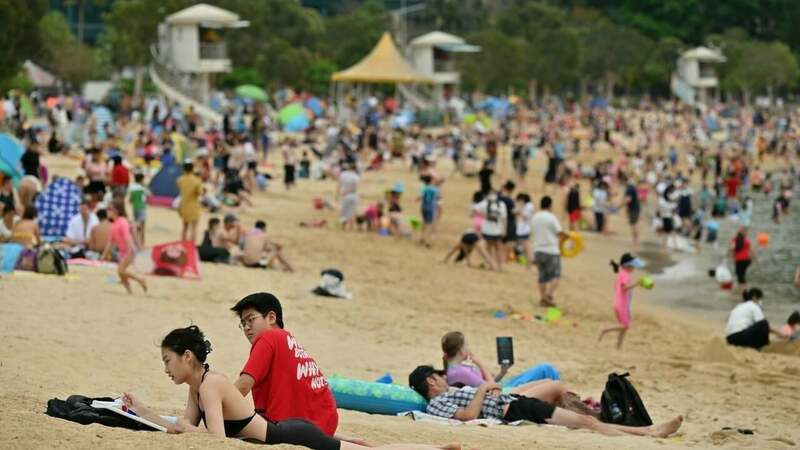 Hong Kong to close off beaches after mainland China uproar