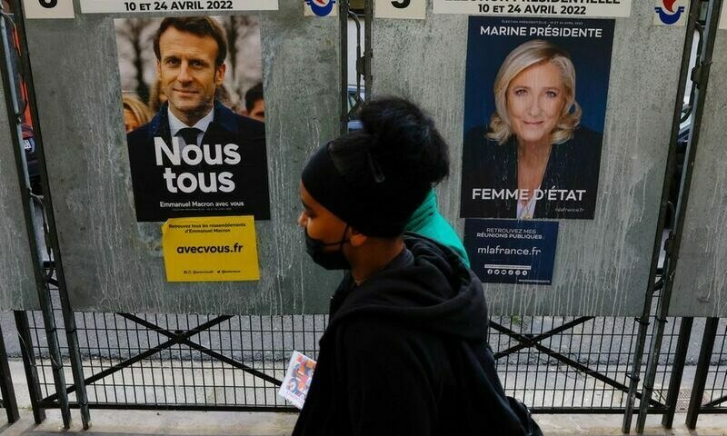 Macron faces a tough fight as France votes on Sunday