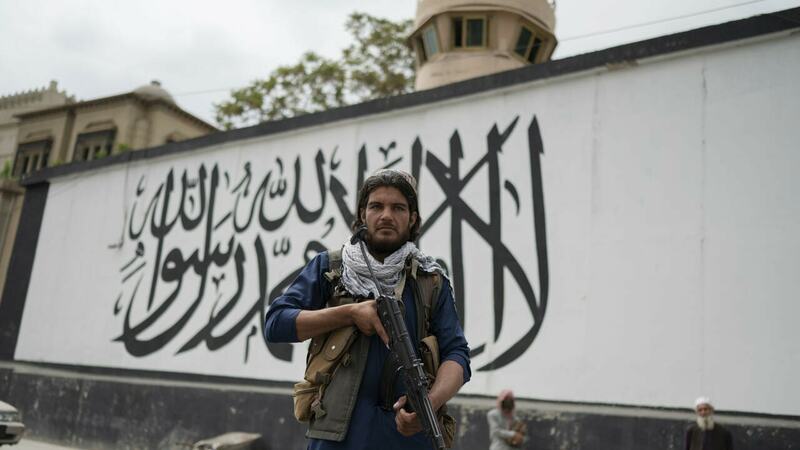 Afghans protest against Iranian 'cruelties' in Taliban-approved demo