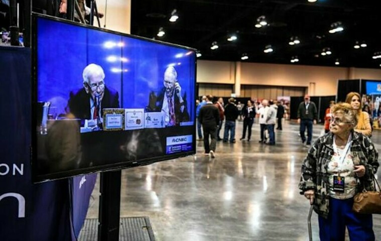 Warren Buffett details spending spree, takes jab at Wall Street