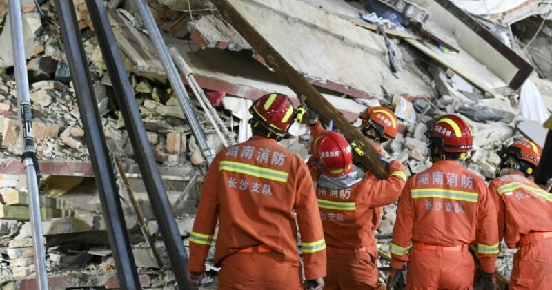Sixth survivor pulled from China building collapse, dozens still missing