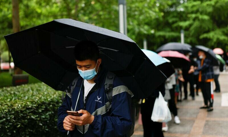Beijing kicks off fresh round of Covid tests as Shanghai postpones crucial exams