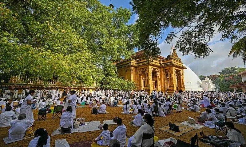 Crisis-hit Sri Lanka lifts curfew for Buddhist festival
