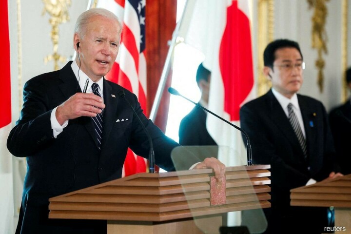 In Tokyo, Biden says would be willing to use force to defend Taiwan