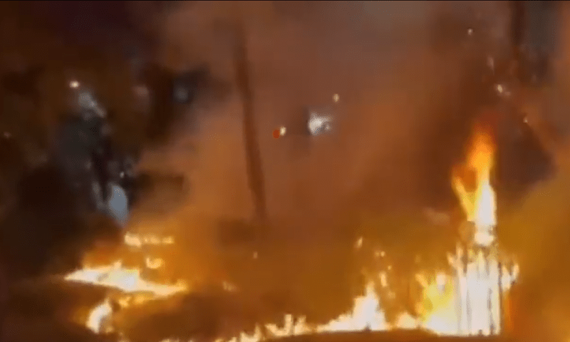 Protesters set trees, vehicle ablaze in Islamabad&rsquo;s Blue Area