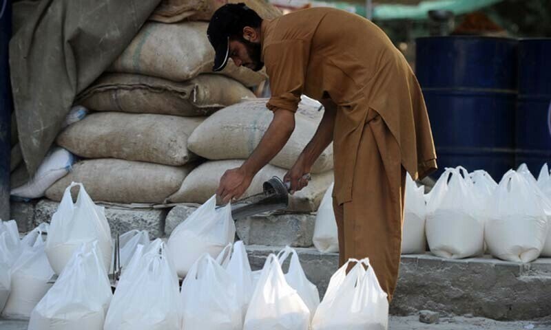 Pakistan feels pain as subsidies ripped off petrol, flour inches up