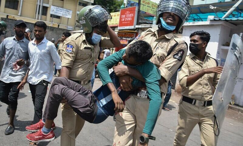 One dead in India unrest over military hiring, some gatherings banned