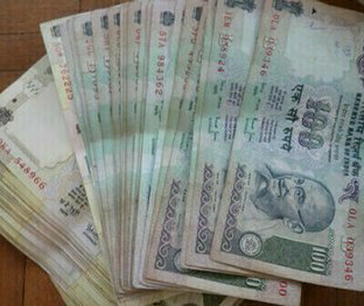 India rupee hits record low on higher global crude prices