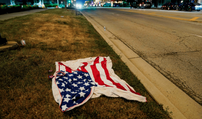 US police arrest suspect after gunman kills 6 at July 4 parade