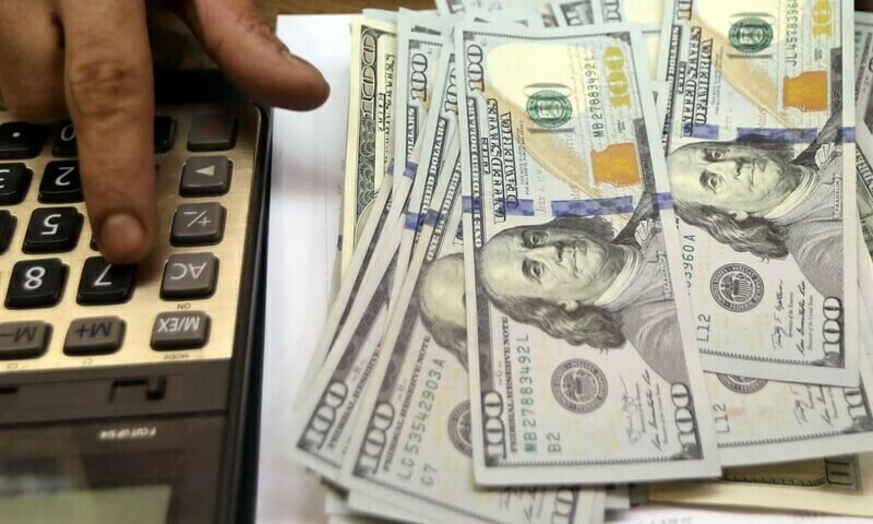 Rupee continues to slide against dollar