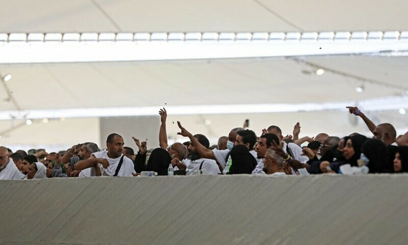 Pilgrims stone the devil as almost million-strong Haj winds down